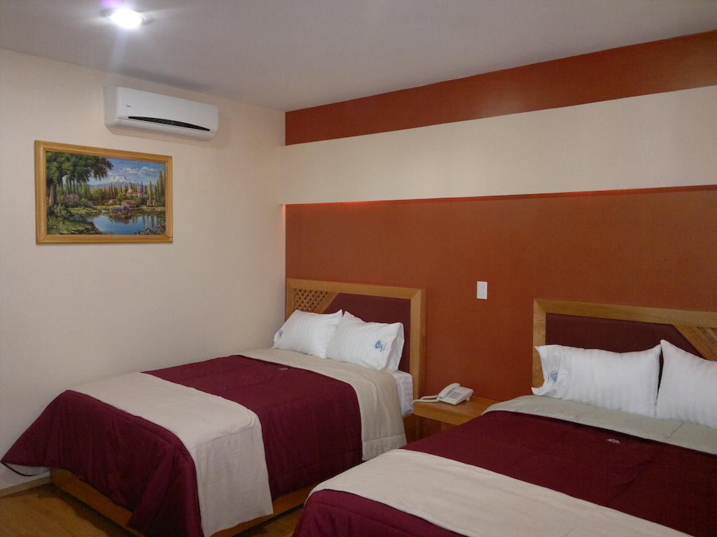 Hotel Global Express Tehuacán Quarto foto